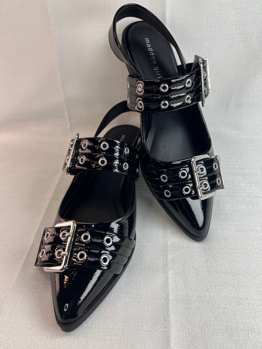 Madden Girl, black patent leather flats with silver hardware